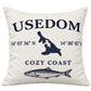 Naturfarbene Cozy Coast Kissenhülle USEDOM 50 x 50 cm mit dunkelblauem Schriftzug, Inselsilhouette und Fischmotiv
